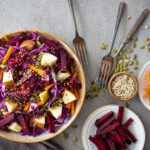 A bowl of beet quinoa salad on the table.