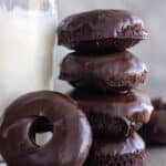 Baked Chocolate Donuts Stacked together.