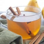 Easy Pear Cider Recipe in a glass mug.