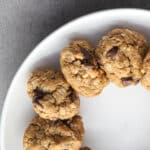 Gluten-free peanut butter cookies on a white plate.