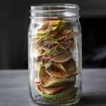 Dehydrated apples in a mason jar.
