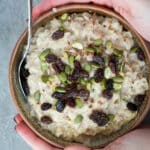 Creamy oatmeal in a ceramic bowl.