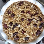 Baked oatmeal in a white pie pan.