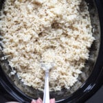 Cooked brown rice in a crockpot.