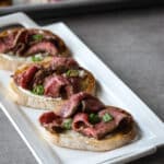 Filet mignon crostinis on a plate