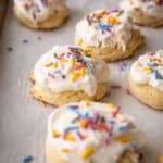 Small batch sugar cookies on a baking sheet pan.