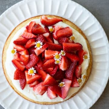 Strawberry Chamomile cake on a white plate.