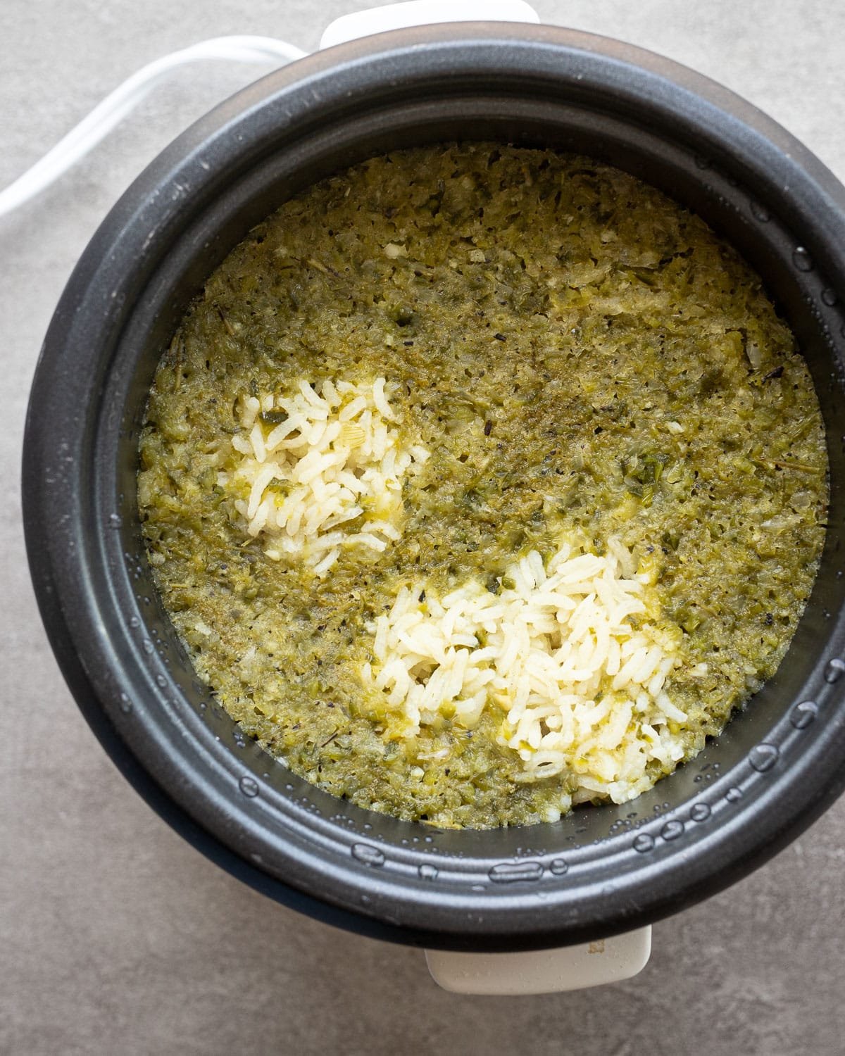 Cooked poblano rice in a rice cooker. 