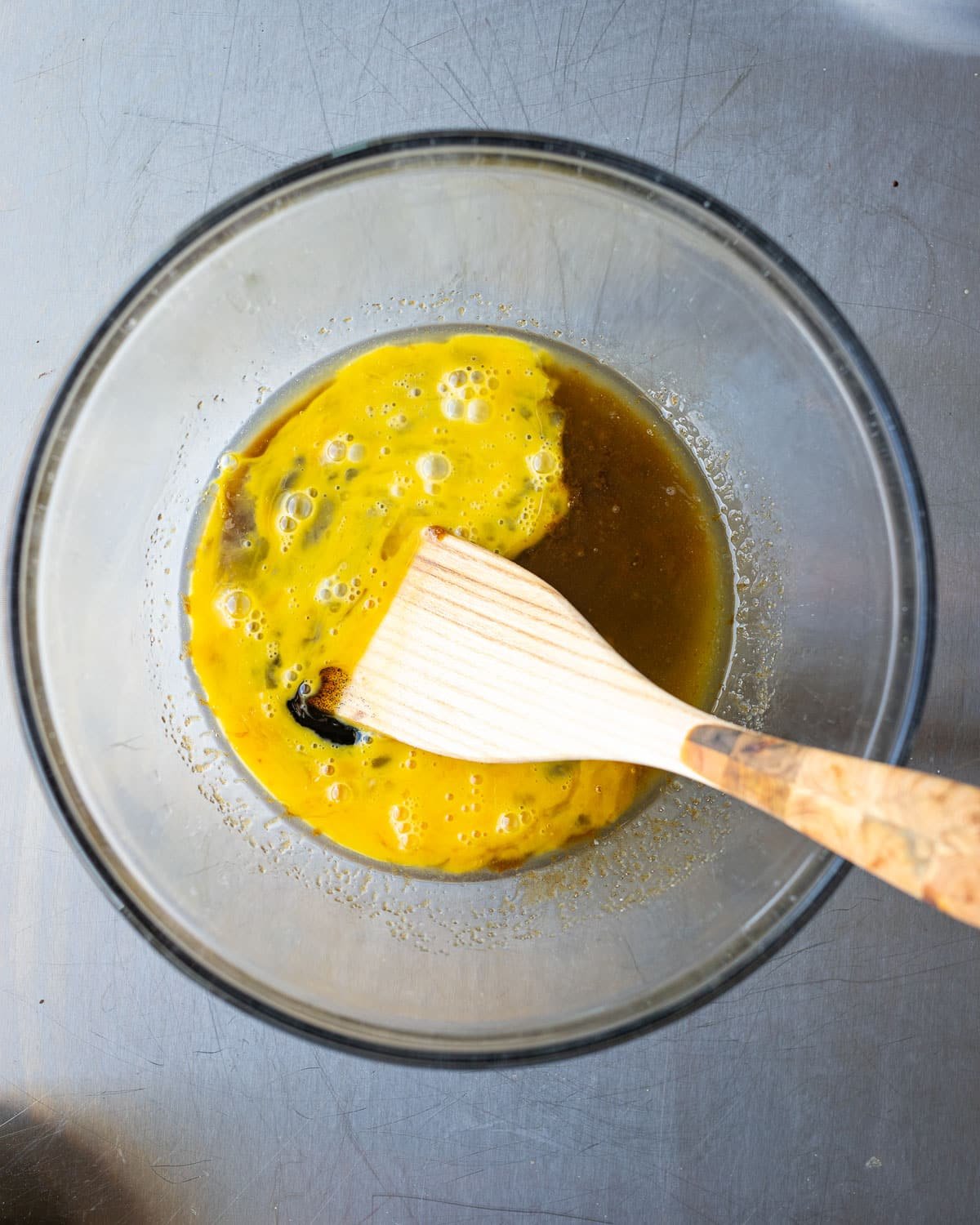 Batter for muffins in a glass bowl. 